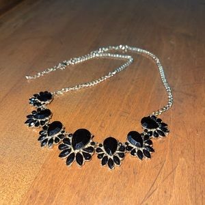 Black jewel gold statement piece